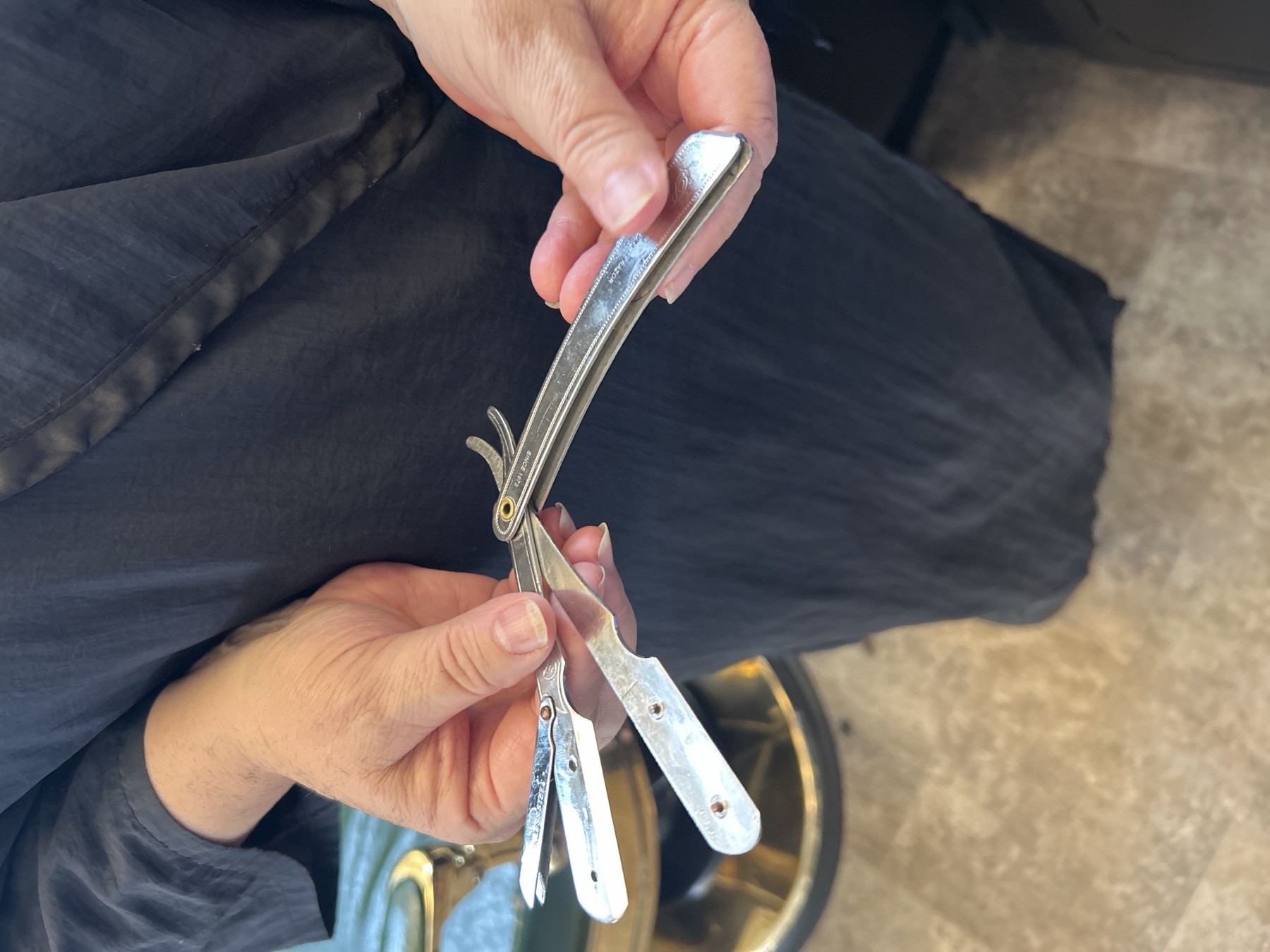 A straight razor held open